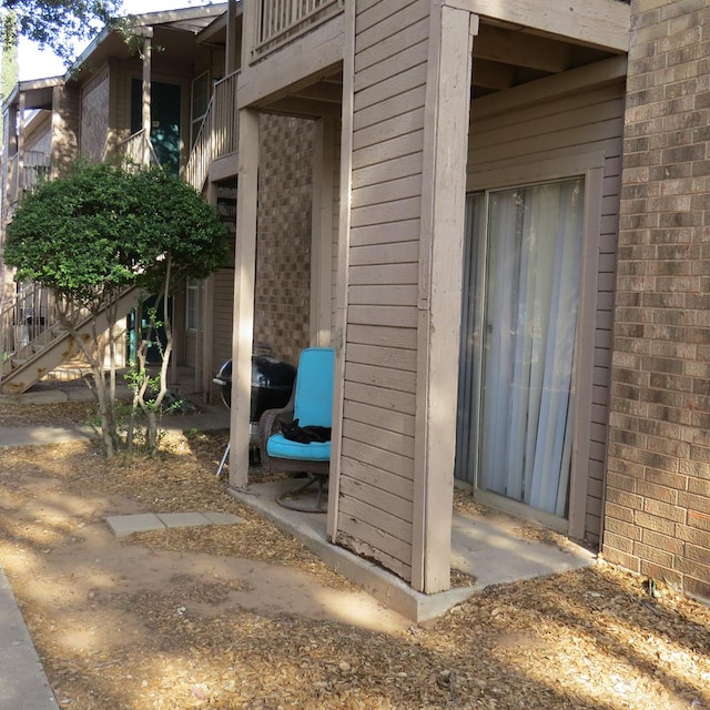 4700 Boulder Ave Unit 611, Midland, TX 79707 - doorway to property featuring brick siding