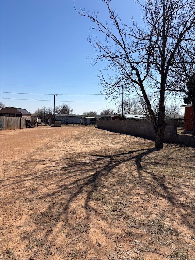 view of yard featuring fence