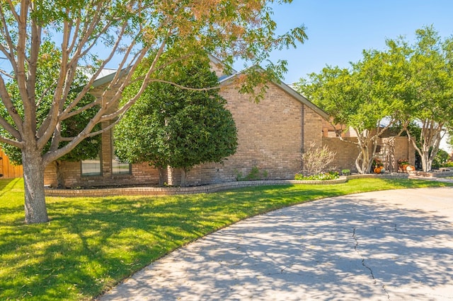 view of front of home with a front yard