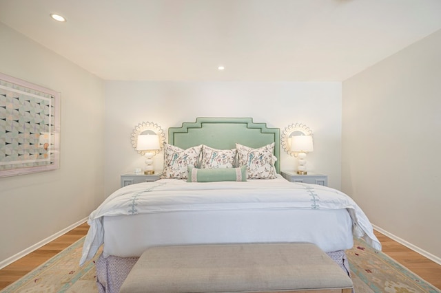 bedroom with light hardwood / wood-style flooring