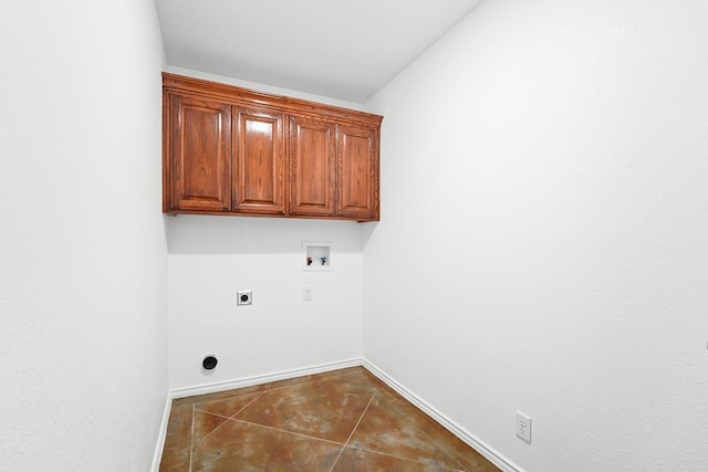 4910 Rio Grande Ave, Midland, TX 79707 - laundry room with hookup for an electric dryer, hookup for a washing machine, and cabinet space