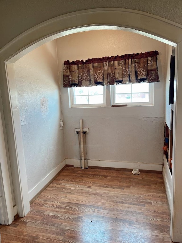501 E 15th St, Big Spring, TX 79720 - empty room featuring light wood-style floors and baseboards