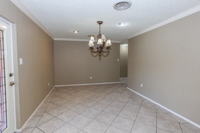 tiled spare room with an inviting chandelier, crown molding, and a textured ceiling