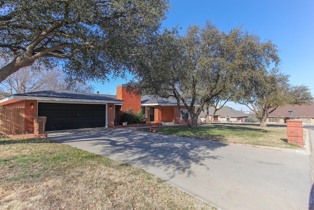 ranch-style home with a front lawn