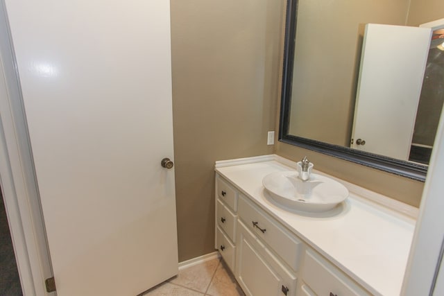 bathroom featuring vanity and tile patterned flooring