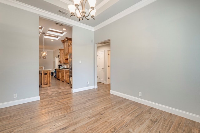 empty room featuring crown molding, baseboards, recessed lighting, light wood-style flooring, and a notable chandelier