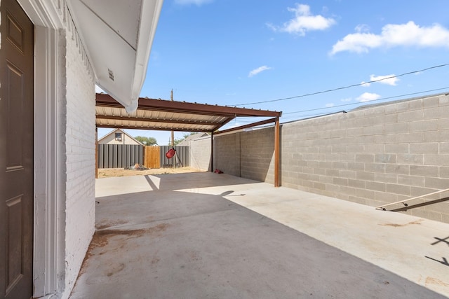 101 Waverly Dr, Midland, TX 79703 - fenced backyard with a patio area and a carport