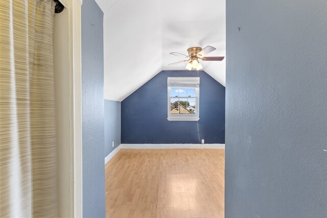 101 Waverly Dr, Midland, TX 79703 - additional living space with wood finished floors, a ceiling fan, and lofted ceiling