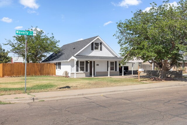 101 Waverly Dr, Midland, TX 79703 - view of front facade featuring a porch and a shingled roof