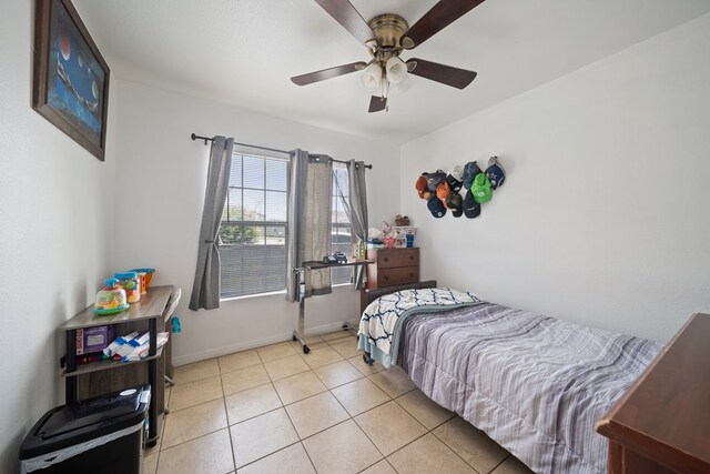 601 Caylor Dr, Big Spring, TX 79720 - bedroom featuring light tile patterned floors and ceiling fan