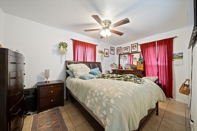 601 Caylor Dr, Big Spring, TX 79720 - bedroom with tile patterned flooring and ceiling fan