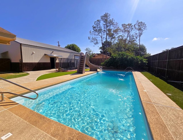3410 Humble Ave, Midland, TX 79707 - view of swimming pool with a water slide and a patio area