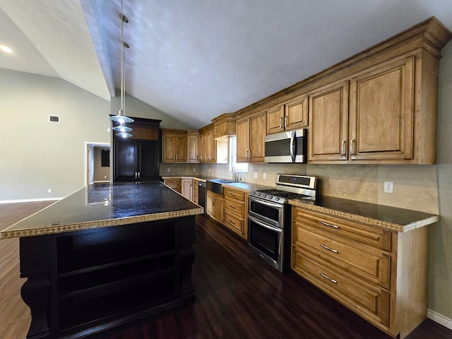 3410 Humble Ave, Midland, TX 79707 - kitchen featuring stainless steel appliances, open shelves, vaulted ceiling, dark wood-style flooring, and brown cabinets