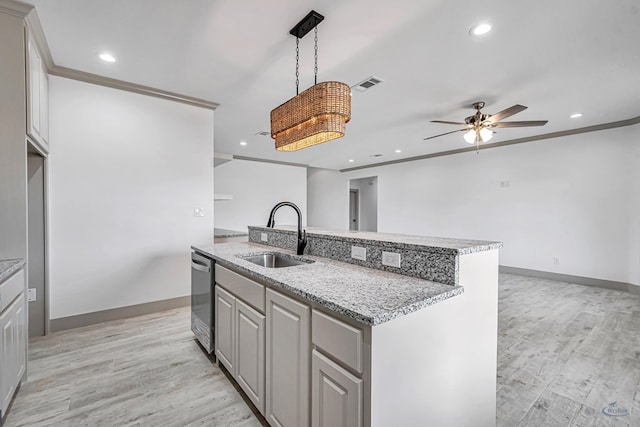 603 S Benton, Midland, TX 79701 - kitchen featuring a sink, ceiling fan, light wood-style floors, an island with sink, and recessed lighting