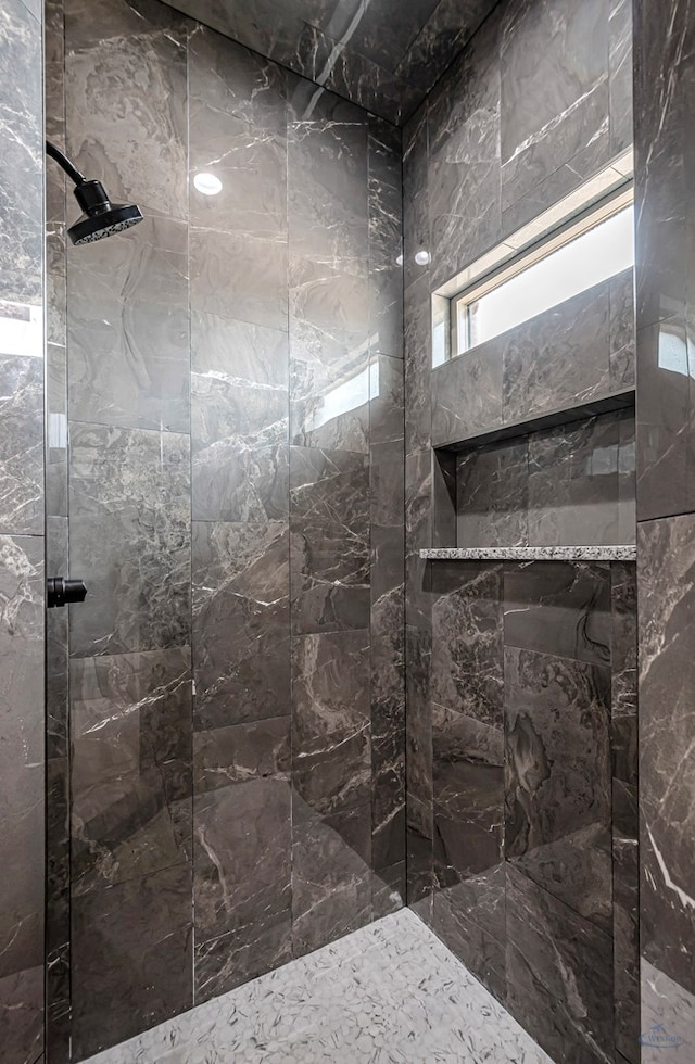 603 S Benton, Midland, TX 79701 - bathroom featuring a tile shower