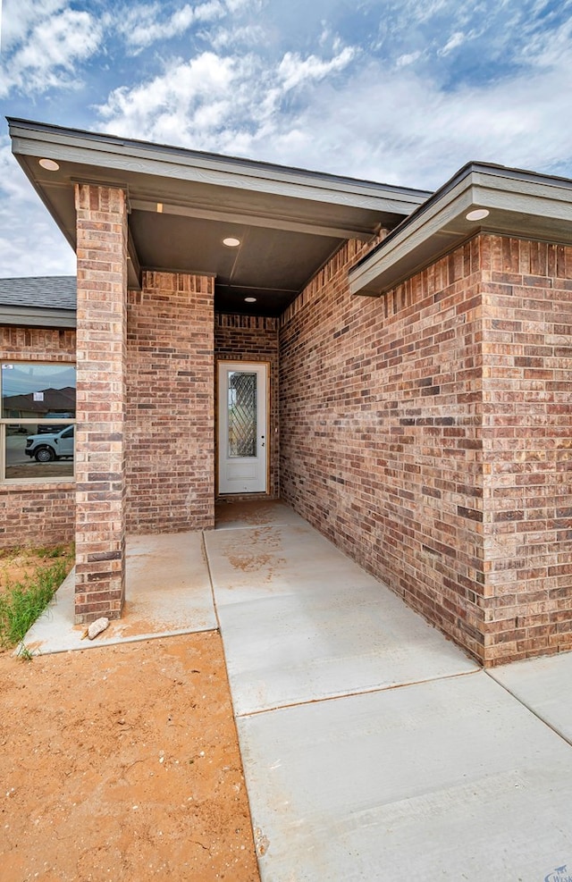 603 S Benton, Midland, TX 79701 - doorway to property with brick siding