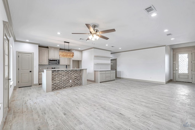 603 S Benton, Midland, TX 79701 - unfurnished living room with light wood-type flooring, ceiling fan, baseboards, ornamental molding, and recessed lighting
