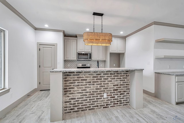 603 S Benton, Midland, TX 79701 - kitchen with stainless steel appliances, open shelves, ornamental molding, backsplash, and light wood finished floors
