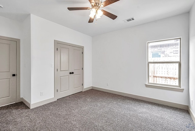 603 S Benton, Midland, TX 79701 - unfurnished bedroom featuring carpet floors, baseboards, and ceiling fan