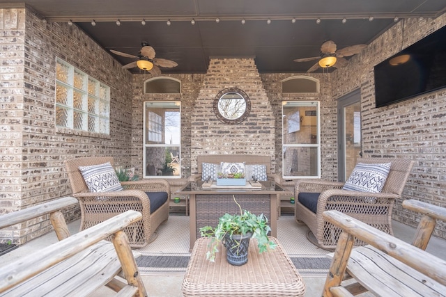 view of patio featuring an outdoor hangout area and ceiling fan