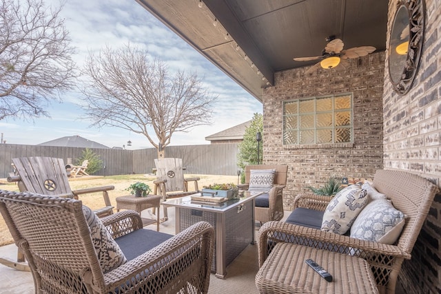 view of patio featuring an outdoor living space and ceiling fan