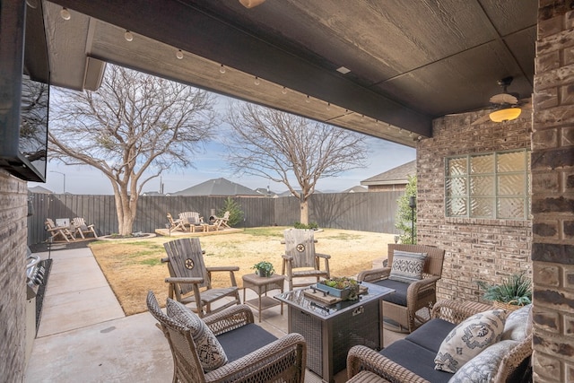 view of patio / terrace with an outdoor hangout area and ceiling fan