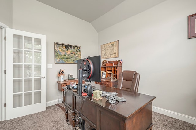office featuring carpet floors, baseboards, and vaulted ceiling