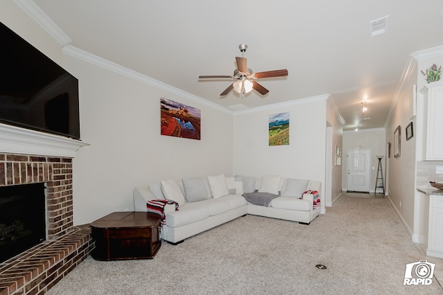 living room featuring visible vents, a ceiling fan, light colored carpet, ornamental molding, and a brick fireplace