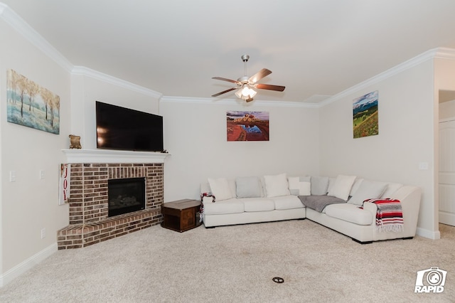 carpeted living room featuring ceiling fan, ornamental molding, a fireplace, and baseboards