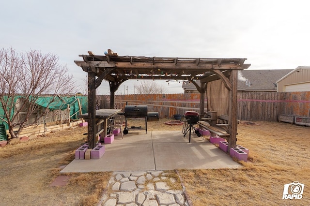 view of patio / terrace with a fenced backyard and a pergola