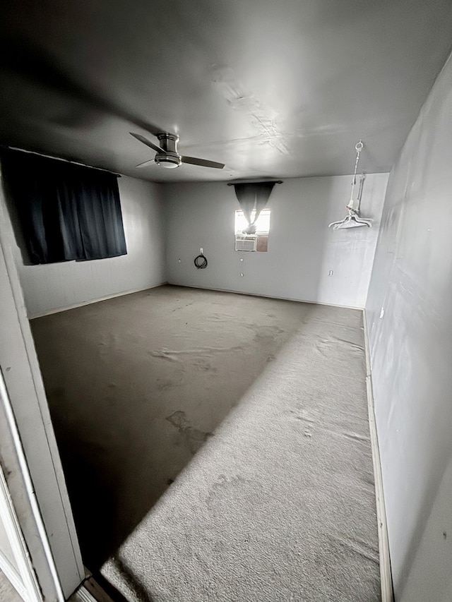 basement featuring ceiling fan