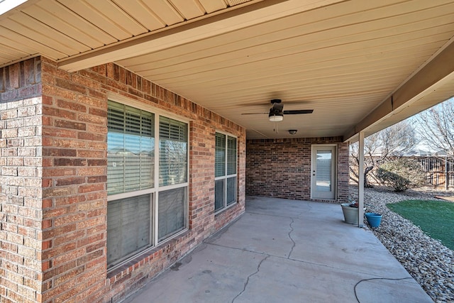 view of patio featuring ceiling fan