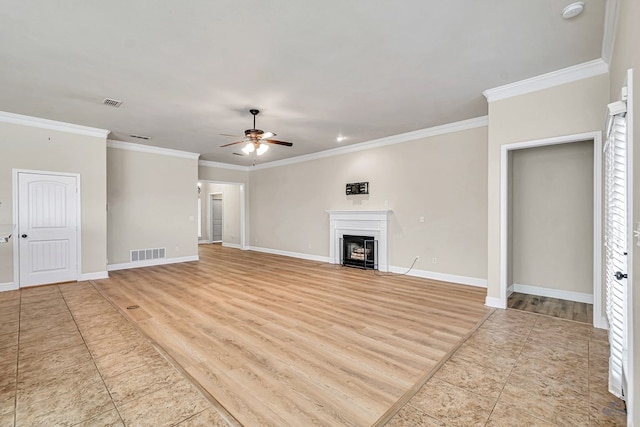 unfurnished living room featuring light wood-type flooring, ceiling fan, and crown molding