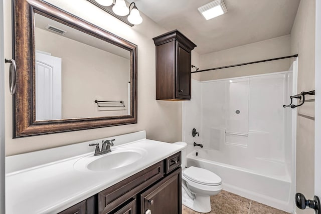 full bathroom with toilet, vanity, and shower / washtub combination