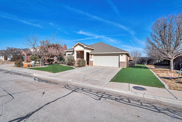 single story home featuring a front lawn and a garage