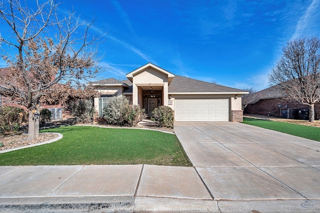 view of front facade with a front yard and a garage