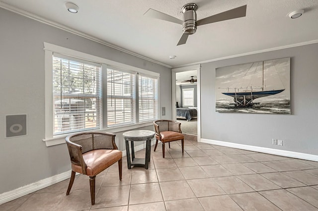 710 W Nobles Ave, Midland, TX 79701 - living area featuring crown molding, ceiling fan, baseboards, and tile patterned flooring
