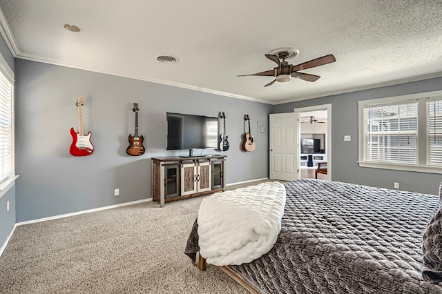 710 W Nobles Ave, Midland, TX 79701 - bedroom with crown molding, baseboards, carpet flooring, and ceiling fan
