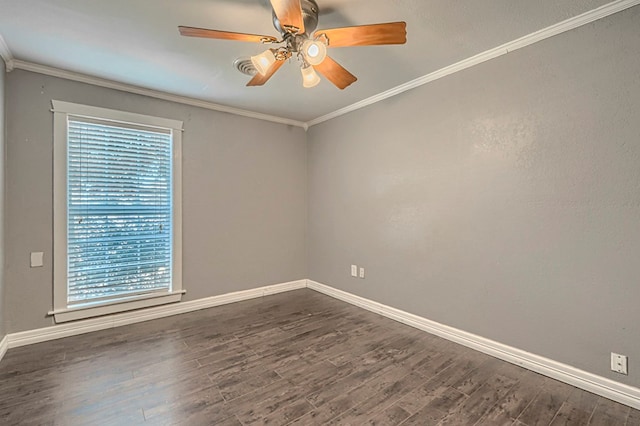 710 W Nobles Ave, Midland, TX 79701 - empty room with plenty of natural light, baseboards, wood finished floors, and crown molding