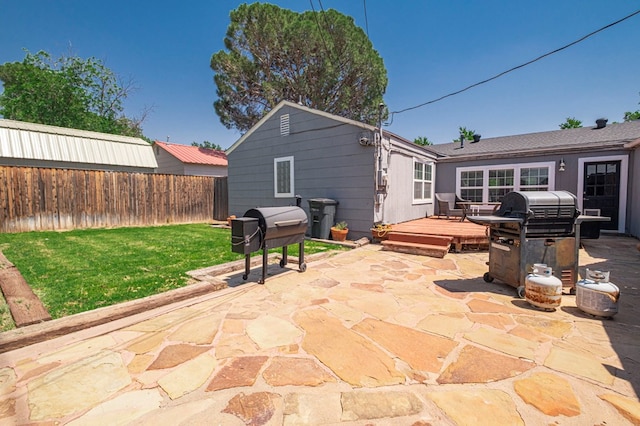 710 W Nobles Ave, Midland, TX 79701 - view of patio / terrace with a wooden deck and area for grilling