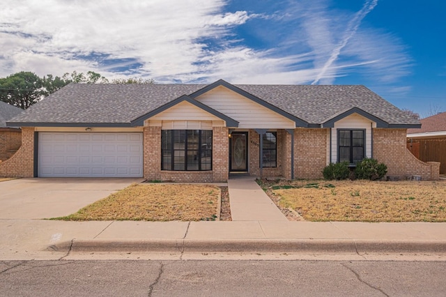 view of front of house featuring concrete driveway, brick siding, an attached garage, and a shingled roof