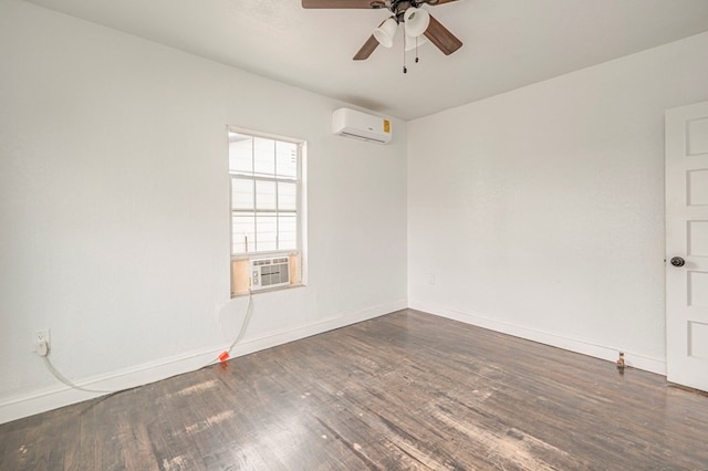 unfurnished room featuring ceiling fan, a wall unit AC, cooling unit, wood finished floors, and baseboards