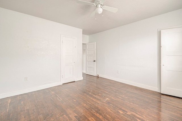 unfurnished bedroom with ceiling fan, baseboards, and wood finished floors