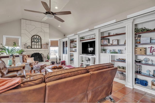 tiled living area featuring recessed lighting, a fireplace, a ceiling fan, and vaulted ceiling