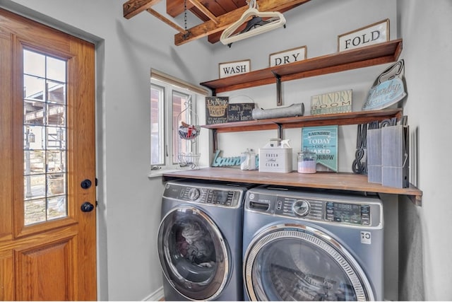 washroom with laundry area and separate washer and dryer