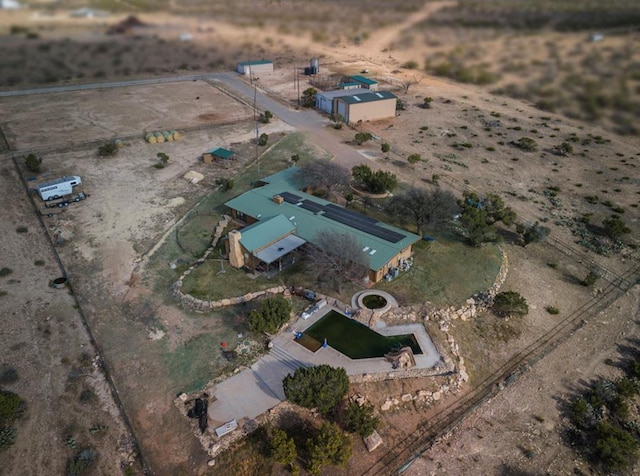 birds eye view of property featuring a rural view