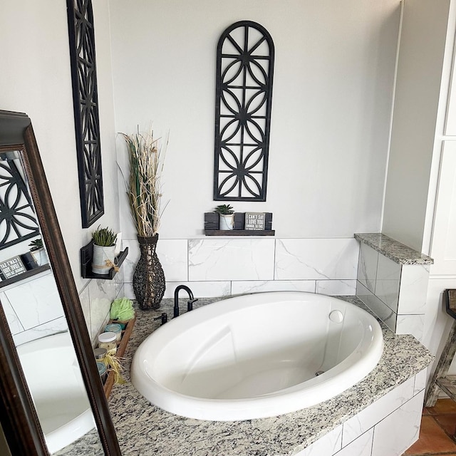 bathroom with a garden tub