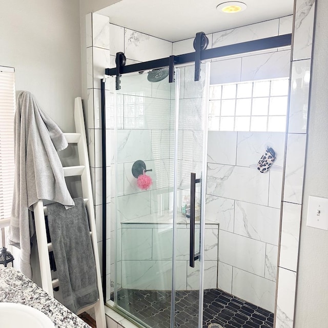 full bathroom featuring a shower stall