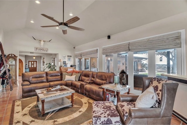 living area with recessed lighting, high vaulted ceiling, ceiling fan, and tile patterned flooring