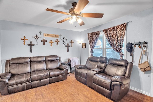 2004 N Monticello St, Big Spring, TX 79720 - living room featuring ceiling fan and wood finished floors